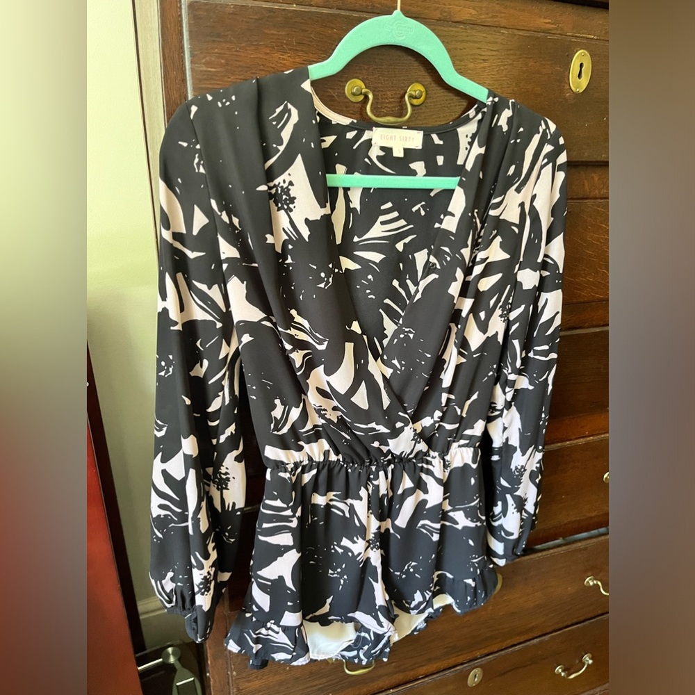 Eight Sixty romper in small in black and pink